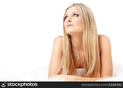 Portrait of beautiful pensive blonde, isolated on a white background