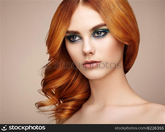 Portrait of beautiful sensual woman with elegant hairstyle. Perfect makeup. Beauty fashion. Eyelashes. Lips. Cosmetic Eyeshadow