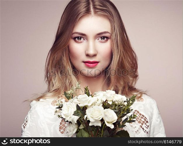 Portrait of beautiful sensual woman with elegant hairstyle. Perfect makeup. Blonde girl. Beauty fashion. Flowers
