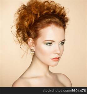 Portrait of beautiful sensual woman with elegant hairstyle. Perfect makeup. Fashion photo