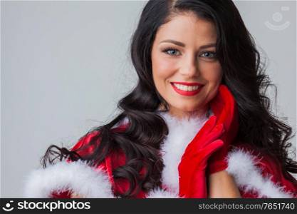 Portrait of beautiful sexy girl wearing santa claus clothes. Girl wearing santa claus clothes