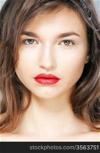 Portrait of beautiful sexy woman with sensual red lips closeup. Studio shot