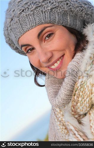 Portrait of beautiful smiling woman in winter