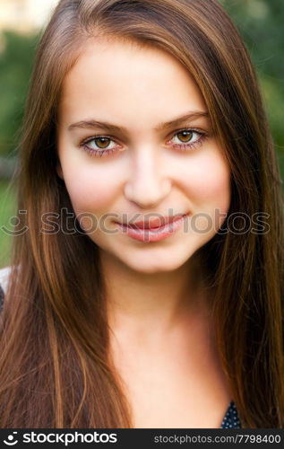 portrait of beautiful teenager woman outdoor