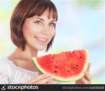 Portrait of beautiful woman eating fresh red ripe watermelon outdoors, tasty dessert of summer season, healthy nutrition&#xA;