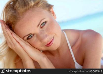 Portrait of beautiful woman in bikini at the beach