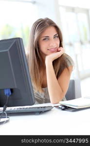 Portrait of beautiful woman in office