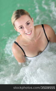 Portrait of beautiful woman in spa jacuzzi