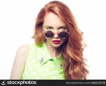 Portrait of beautiful woman in sunglasses on white background. Fashion photo