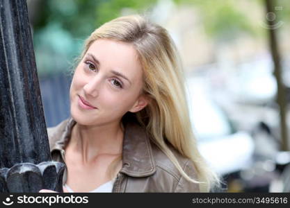 Portrait of beautiful woman in town