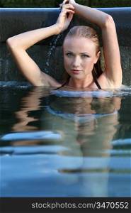 Portrait of beautiful woman in water