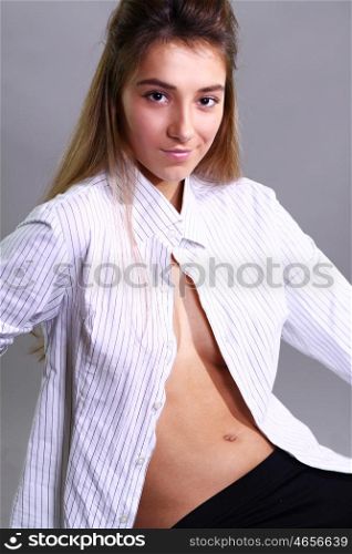 Portrait of beautiful woman in white shirt