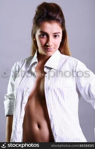 Portrait of beautiful woman in white shirt