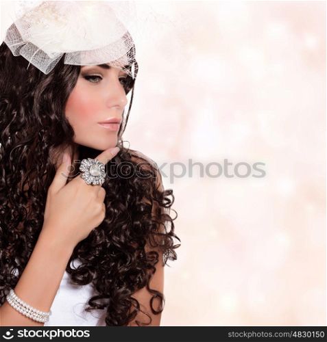 Portrait of beautiful woman isolated on white background, elegant bride, wearing stylish hat with veil, black curly hair, fashionable look