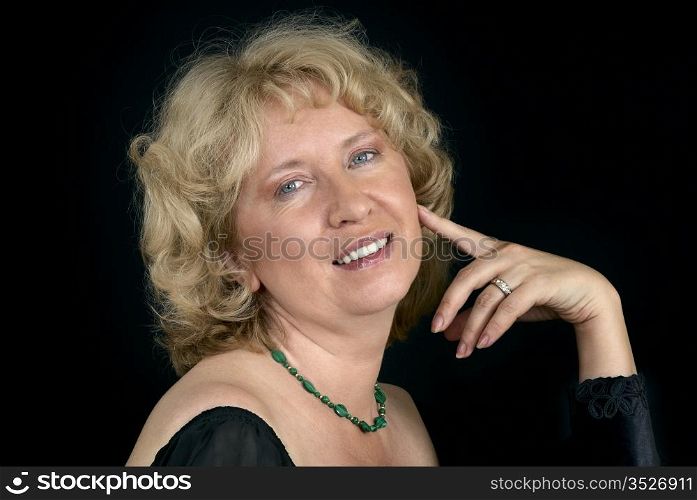 Portrait of beautiful woman on a black background