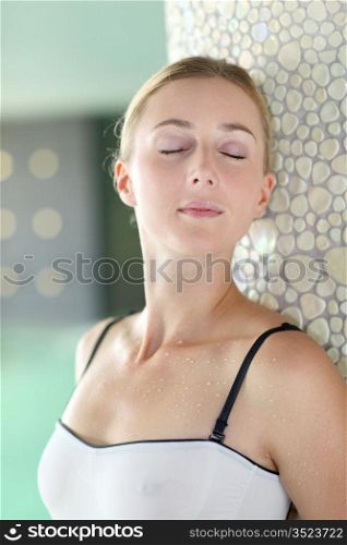 Portrait of beautiful woman relaxing in spa resort