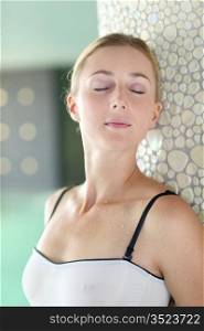 Portrait of beautiful woman relaxing in spa resort