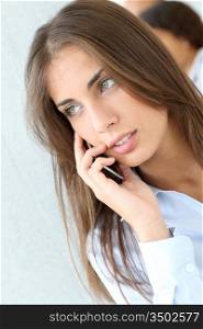 Portrait of beautiful woman talking on mobile phone