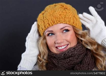 Portrait of beautiful woman wearing winter accessories