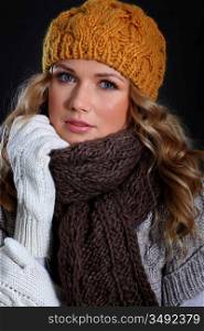 Portrait of beautiful woman wearing winter accessories