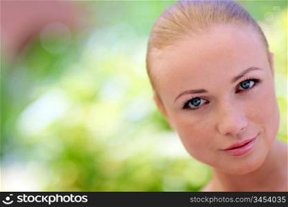 Portrait of beautiful woman with blue eyes