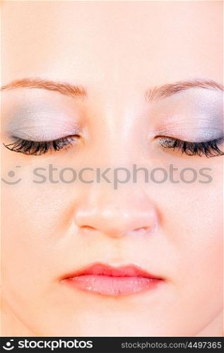 Portrait of beautiful woman with close eyes