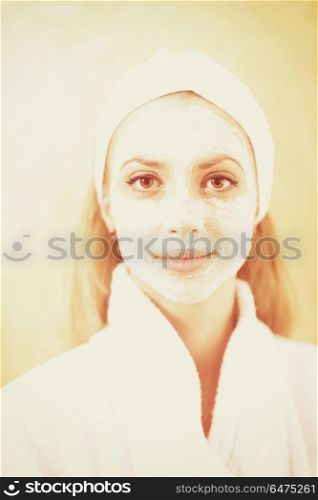 portrait of beautiful woman with cosmetic mask on face in spa and wellness salon. woman in spa with cosmetic mask