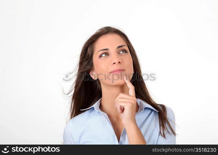 Portrait of beautiful woman with hand on chin