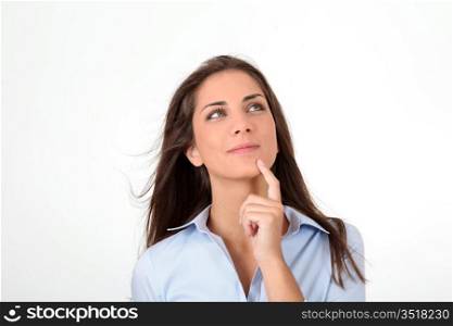 Portrait of beautiful woman with hand on chin