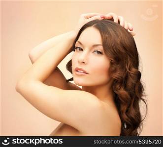 portrait of beautiful woman with long curly hair