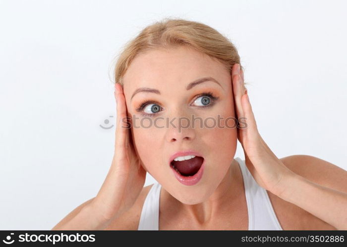 Portrait of beautiful woman with surprised look