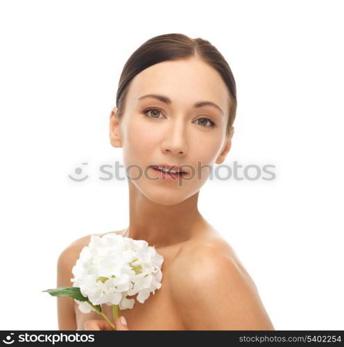 portrait of beautiful woman with white flower