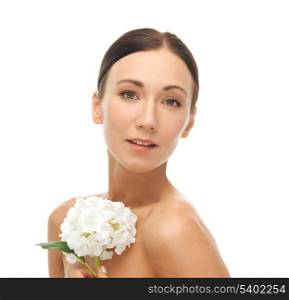 portrait of beautiful woman with white flower