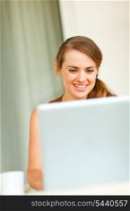 Portrait of beautiful woman working on laptop&#xA;