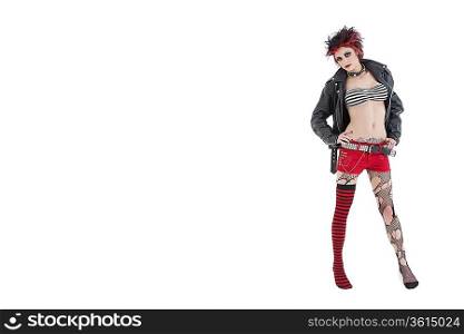 Portrait of beautiful young punk woman posing over white background