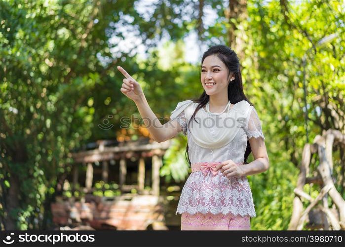 portrait of beautiful young woman in Thai traditional dress