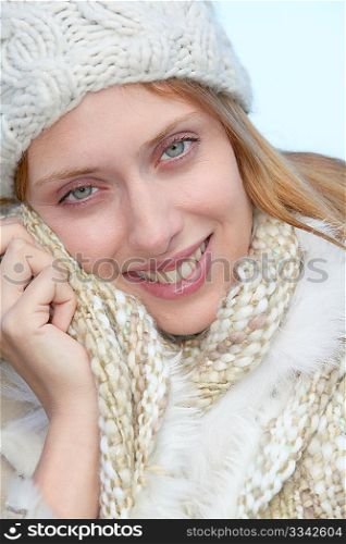 Portrait of beautiful young woman in winter