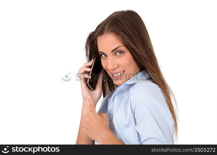 Portrait of beautiful young woman talking on mobilephone