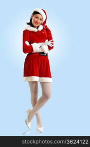 Portrait of beautiful young woman wearing santa claus clothes