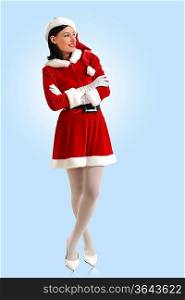 Portrait of beautiful young woman wearing santa claus clothes