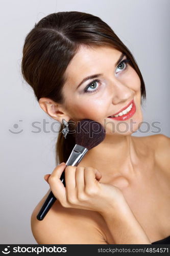 Portrait of beautiful young woman with natural look