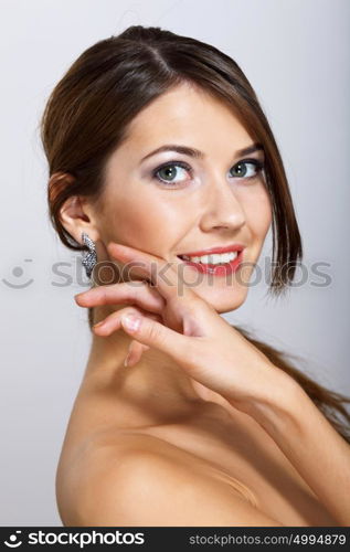 Portrait of beautiful young woman with natural look