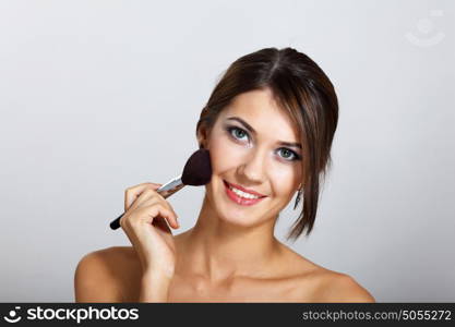 Portrait of beautiful young woman with natural look