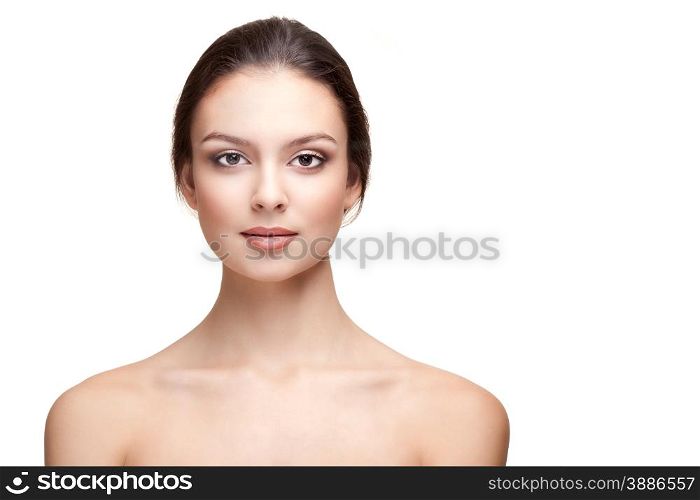 Portrait of Beautiful Young Woman with Perfect Skin on the White Background. Head and Shoulders