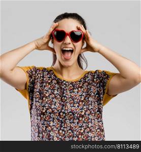 Portrait of Beautilful happy woman wearing sunglasses 