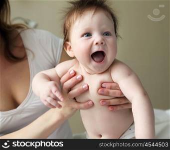 portrait of beautuful redhair infant with blue eyes
