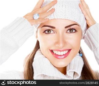 Portrait of beauty woman in white cap and pullover. Happy smile