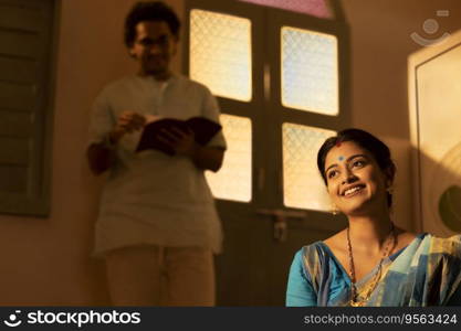Portrait of Bengali couple at home