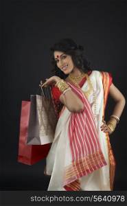 Portrait of Bengali woman with shopping bags