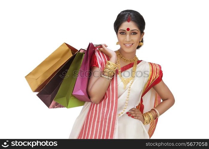Portrait of Bengali woman with shopping bags